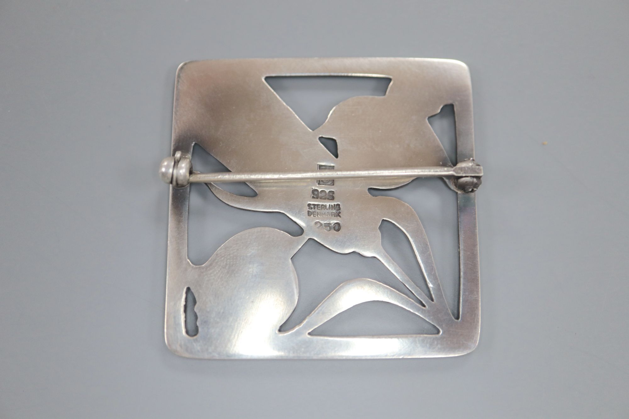 A Georg Jensen sterling Robin and wheatsheaf square brooch, no. 250, 37mm.